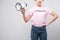 cropped view of woman in pink feminist t-shirt holding megaphone,