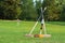 Croquet equipment propped up ready for use