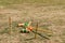 Croquet sports equipment in a field.