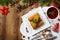 Croquettes with sauerkraut and mushrooms served with beetroot soup. Christmas decoration