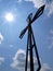 The cross on the background of clear sky at the top Biaklo (or M