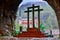 Cross and Basilica de Covadonga, from inside the holy cave