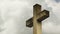 Cross on the cemetery. Time lapse clouds flowing past a stone cross on a graveyard.