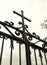 Cross on church gate, silhouette