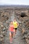 Cross country running woman and man trail runners