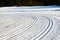 Cross country ski trails in snowy field winter season patterns