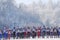 Cross country skiers running in forest