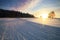 Cross country skiing. A magical start to a new day  in the meadows of the Stolowe Mountains National Park in Poland.