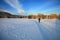 Cross country skiing. A magical start to a new day  in the meadows of the Stolowe Mountains National Park in Poland.