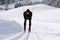 Cross-country skiing on a trail in snowy landscape