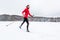 Cross-country skiing: young woman cross-country skiing