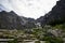 Cross on the Czarny Staw lake in Tatra Mountains