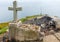 Cross and fireplace on Cape Fisterra Galicia, Spain.