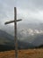 Cross in the fog in Dolomiti mountains