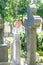 Cross headstone on grave