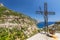 Cross on the hill with beautiful view on the Positano village, Amalfi coast in Italy