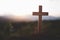 Cross of jesus The background of the setting sun is about to turn down. Christian religious concepts Crucifixion of faith and