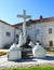 Cross and Jesus christ in Raseiniai churchyard, Lithuania