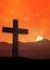 Cross of jesus in front of mountains at sunset 2