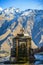 Cross in Kazbegi with view of mountain Kazbek.