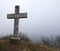 cross over the hill during a misty day near the town of Lumignan