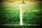 Cross of painted white lines on natural football grass. Artificial green turf texture.
