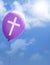 Cross on purple balloon