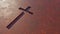 Cross on a  rusted corroded metal or steel sheet backround. 3d illustration metaphor for God, Christ