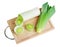 Cross-section of green leek on wooden board