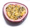 Cross section of passion fruit with pulpy juice filled with seeds. White background