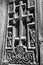 Cross on the stone wall of the temple of Geghard monastery, Armenia.