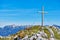 A cross from the top of the mountain Hoher Sarstein. Beautiful landscape. Salzkammergut region, Bad Goisern, Austria.