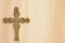 Cross on wood background