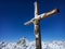 Cross with a wooden figure of Jesus Christ at peak of Klein Matterhorn mountain