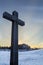 Cross with Woodland cemetery in Stockholm in back