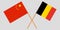 The crossed Belgium and China flags. Official colors. Vector