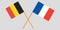 The crossed Belgium and France flags. Official colors. Vector