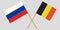 The crossed Belgium and Russian flags