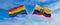 crossed flags of lgbt and Ecuador flag waving in the wind at cloudy sky. Freedom and love concept. Pride month. activism,