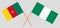 Crossed flags of Nigeria and Cameroon
