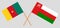 Crossed flags of Oman and Cameroon