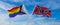 crossed flags of progress lgbt pride and confederate battle or Dixie flag flag waving in the wind at cloudy sky. Freedom and love