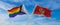 crossed flags of progress lgbt pride and Montenegro flag waving in the wind at cloudy sky. Freedom and love concept. Pride month.