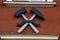 Crossed hammer and pickaxe, mining symbol on building