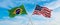 crossed national flags of Brazil and United States of America flag waving in the wind at cloudy sky. Symbolizing relationship,
