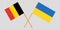 Crossed Ukraine and belgium flags. Official colors. Correct proportion. Vector