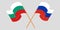 Crossed and waving flags of Bulgaria and Russia
