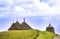 Crosses and roof relief of church behind the hill