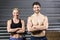 Crossfit couple smilling at the camera