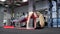 Crossfit fitness TRX training exercises at gym woman push-up workout